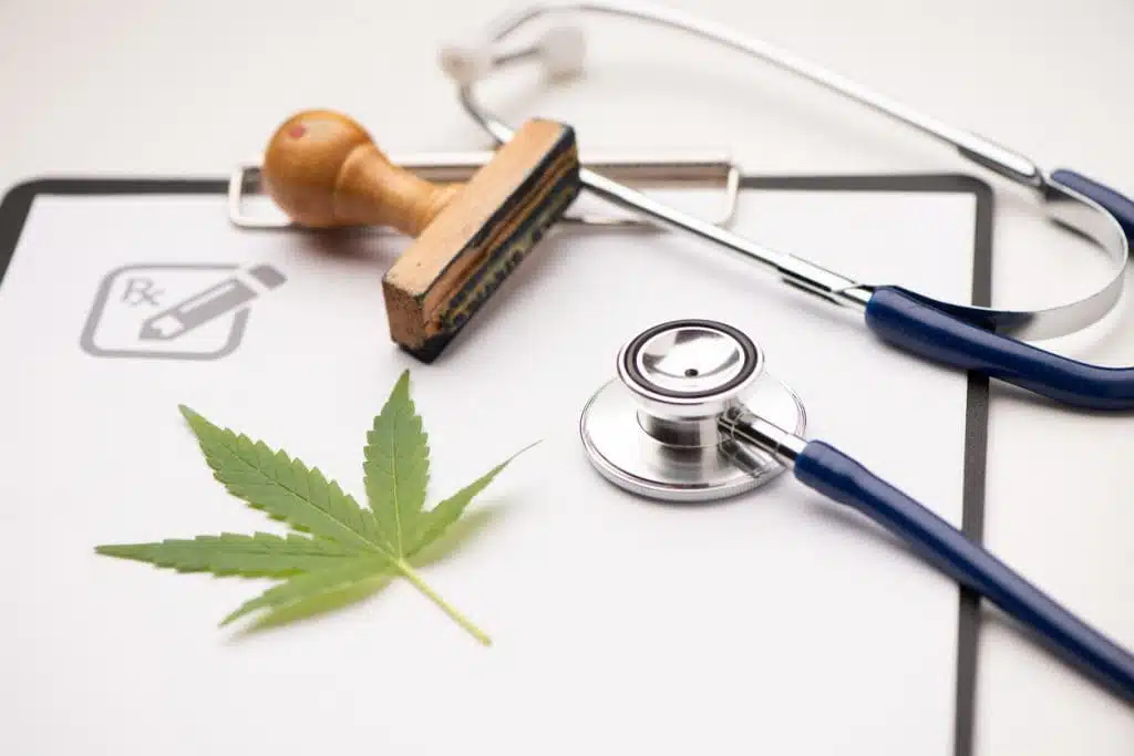 Medical marijuana prescription with stethoscope .